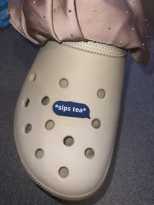 *sips tea* shoe charm