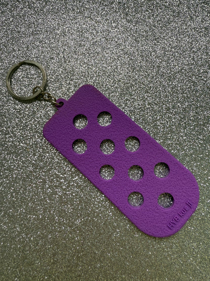 Shoe charm keychains/keyrings - varies colours. Does not contain charms