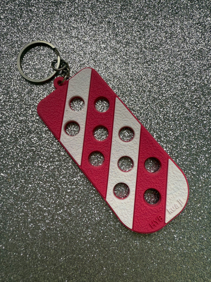 Shoe charm keychains/keyrings - varies colours. Does not contain charms