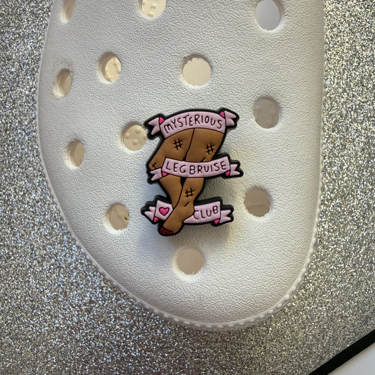 Mystery leg bruise club shoe charm